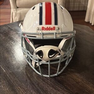 Riddell White Football Helmet with Red and Blue Stripes